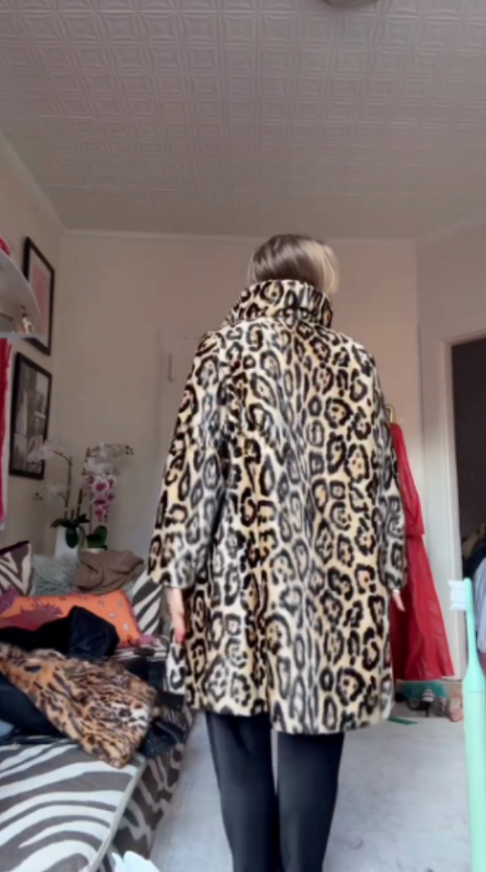 Leopard print faux fur coat
