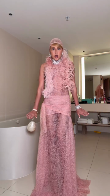 Pink retro-style gorgeous lace and feather suit