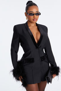 Black feather-trimmed suit dress