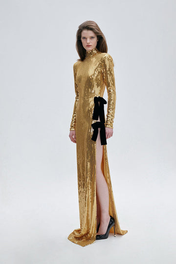 High-slit gold sequined dress