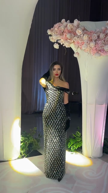 Silver sequined off-shoulder maxi dress