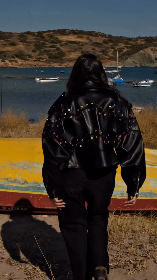 Black leather multi-colored perforated suit